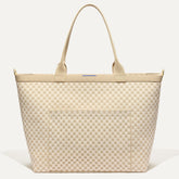 PLP |The Zip Travel Tote in Parchment Basketweave shown from the front.