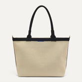 PDP |The Lightweight Zip Tote in Black and White Raffia-Knit shown from the front.