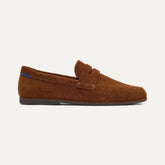 side | The Ravello Penny Loafer in Russet shown from the side.