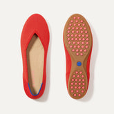 PLP |The Daily Flat in Showstopper Red shown from the top with one shoe showing the outsole.