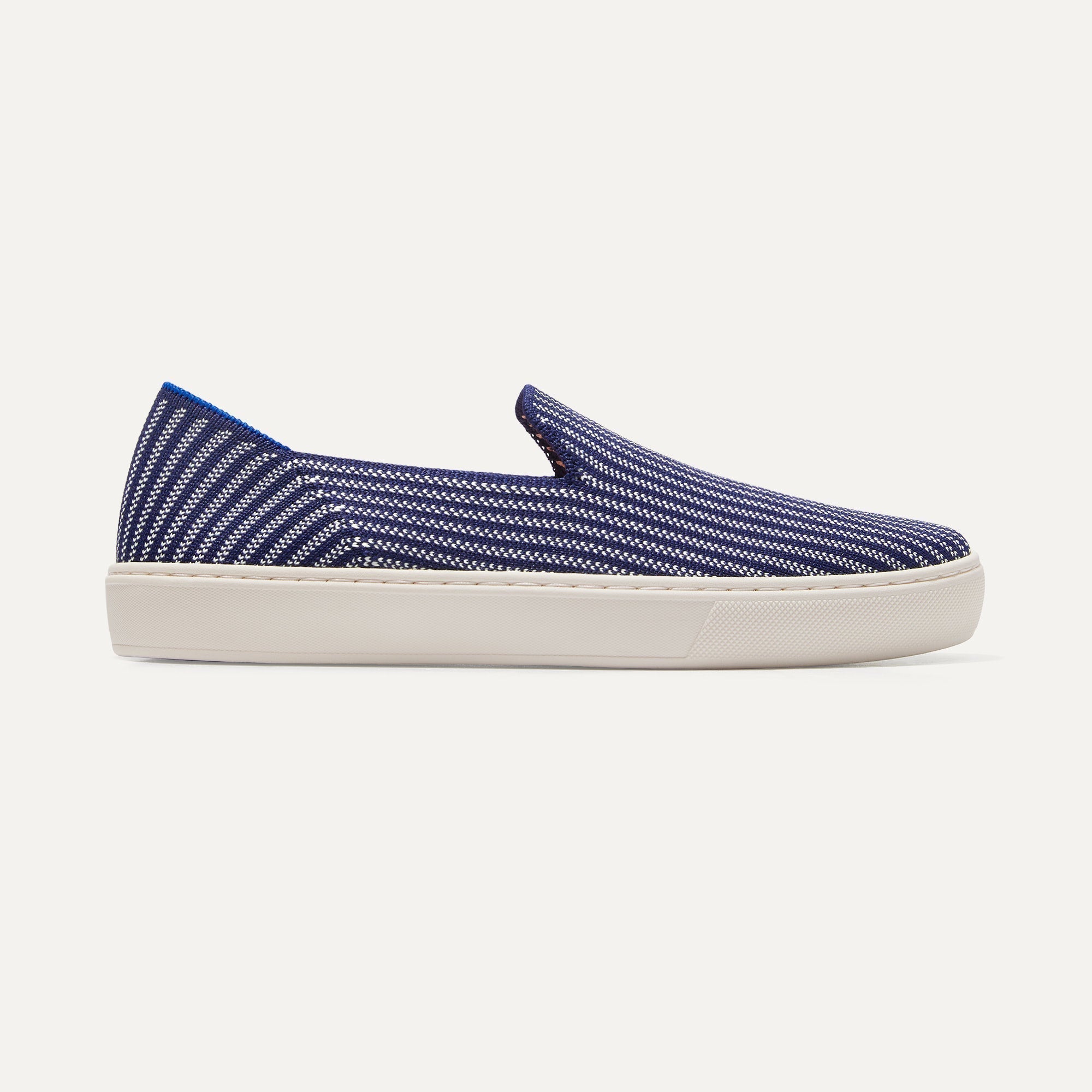 The Sneaker in Riviera Pinstripe shown from the side. 