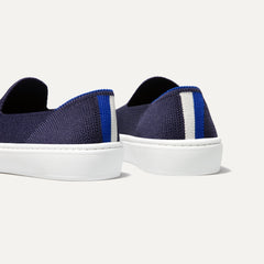 hover | The Kids slip-on Sneaker in Deep Navy shown from the back view with the heel detail.