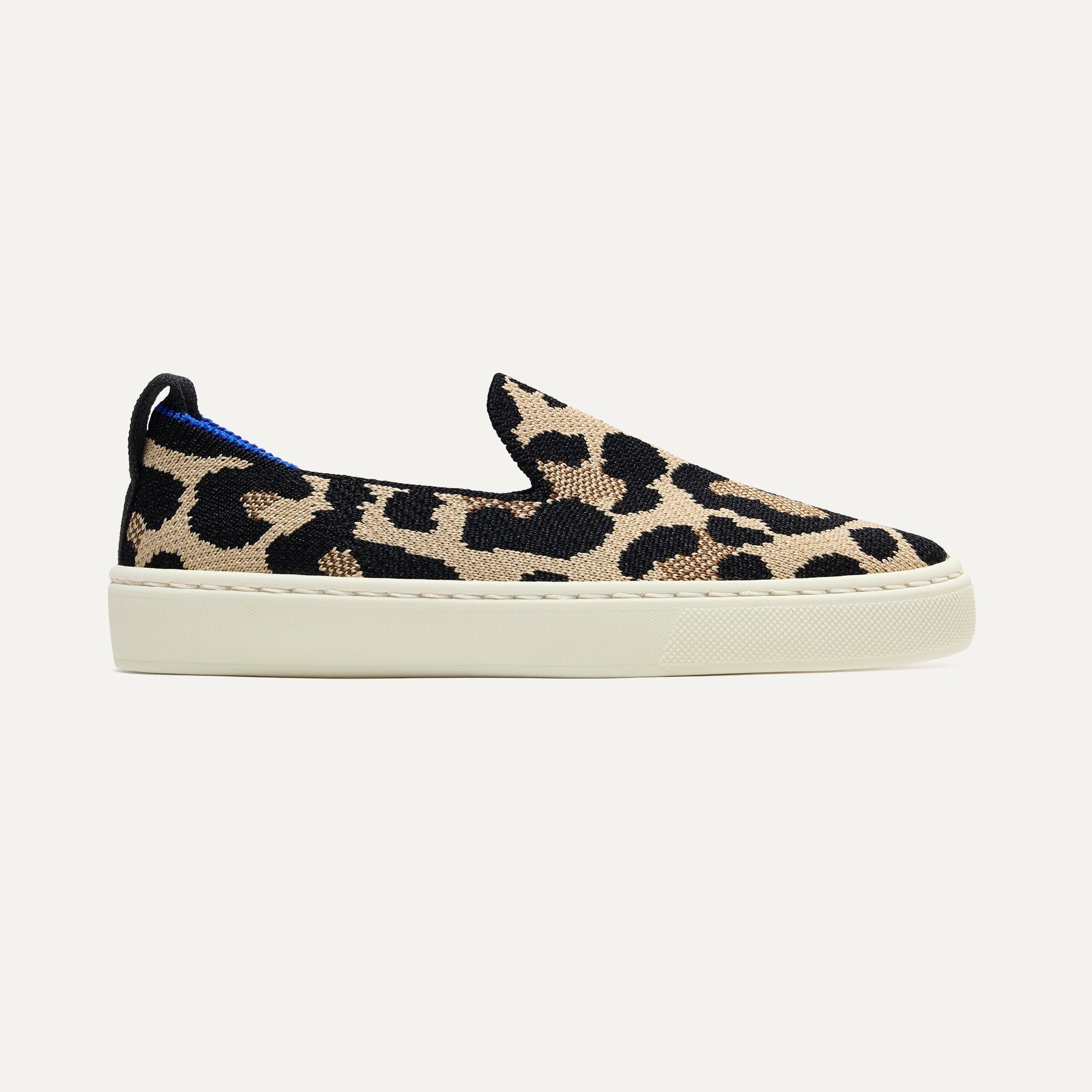 side | The Kids Sneaker in Desert Cat, shown from the side.