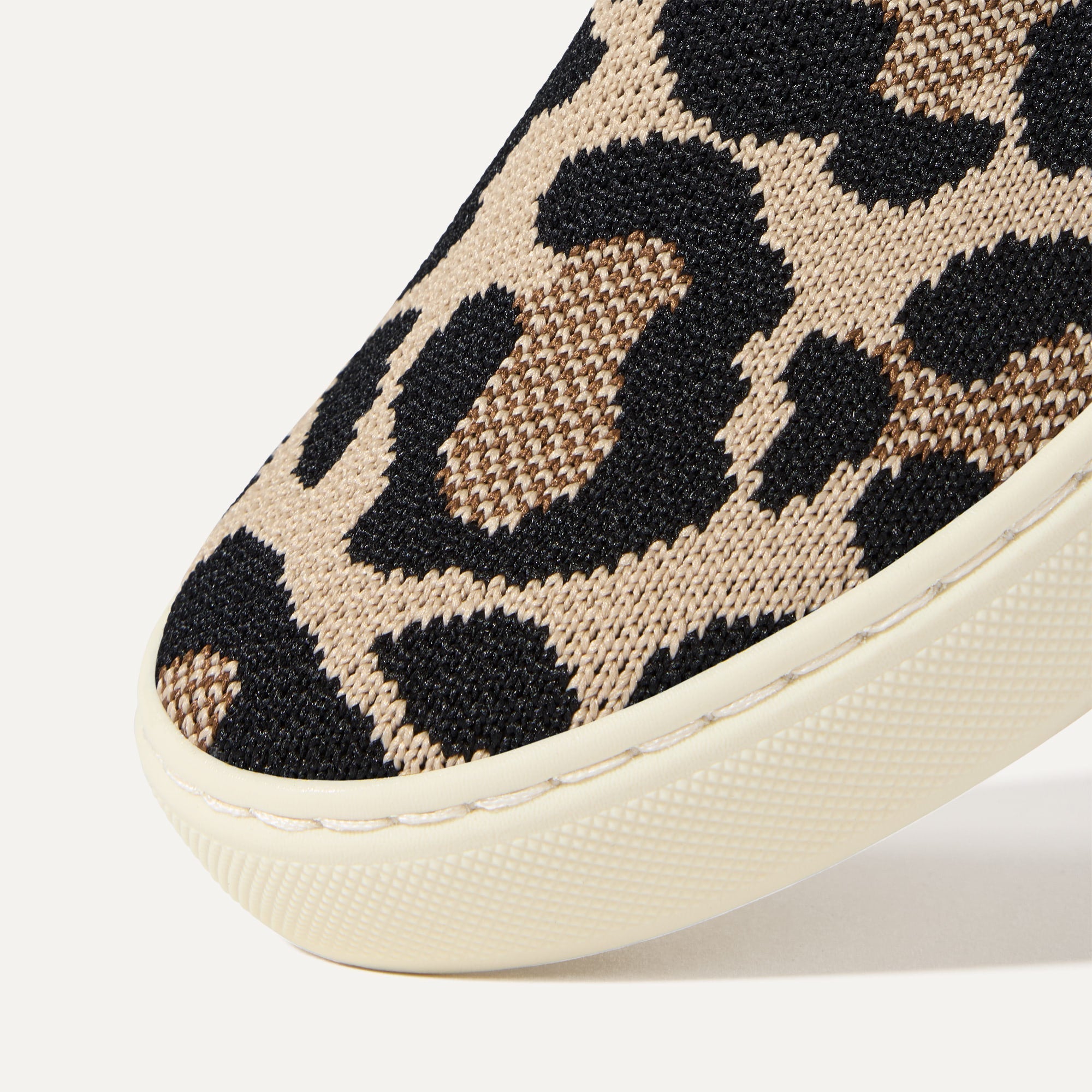 Close up of the toe and vamp of The Kids Sneaker in Desert Cat.