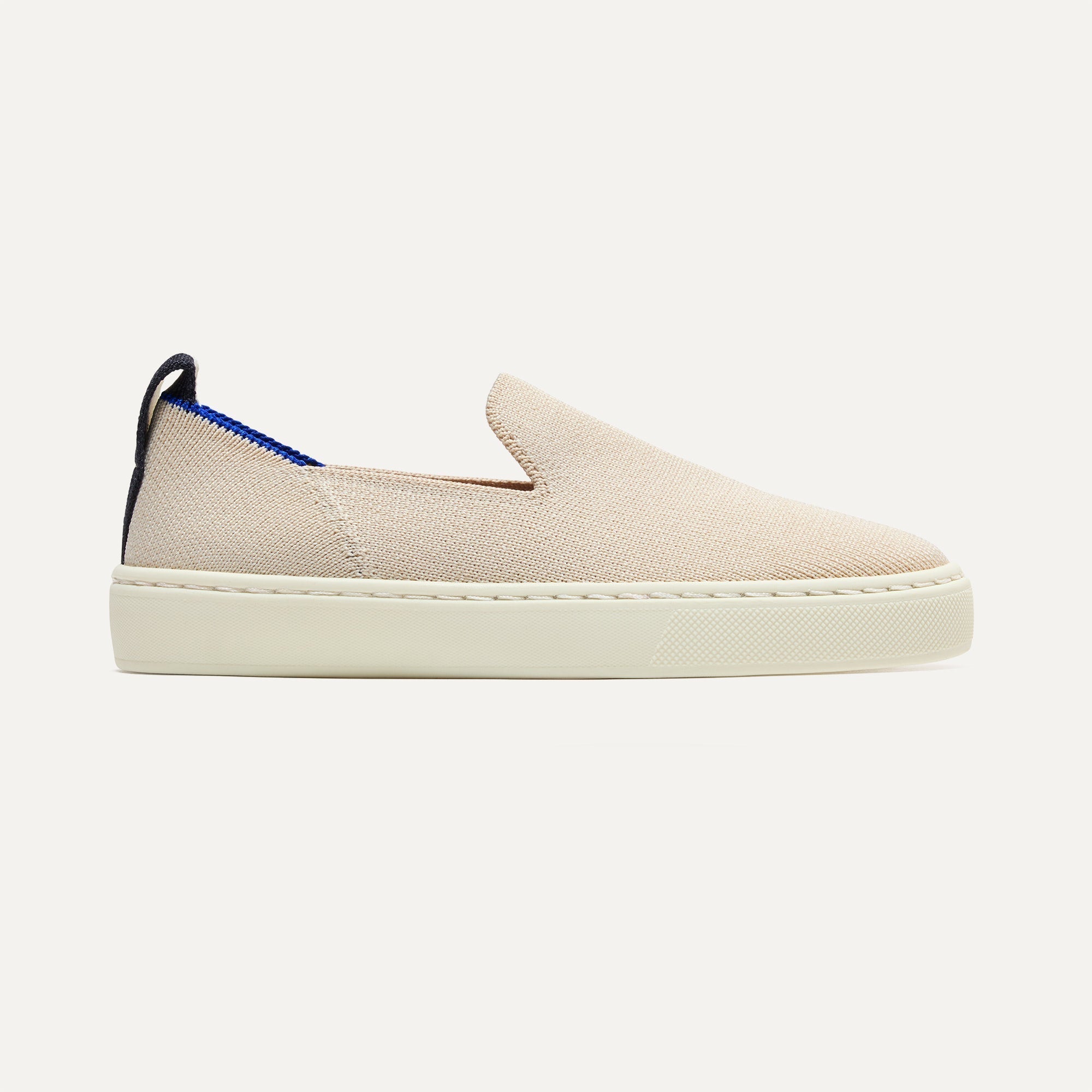 side | The Kids Sneaker in Sand shown from the side.