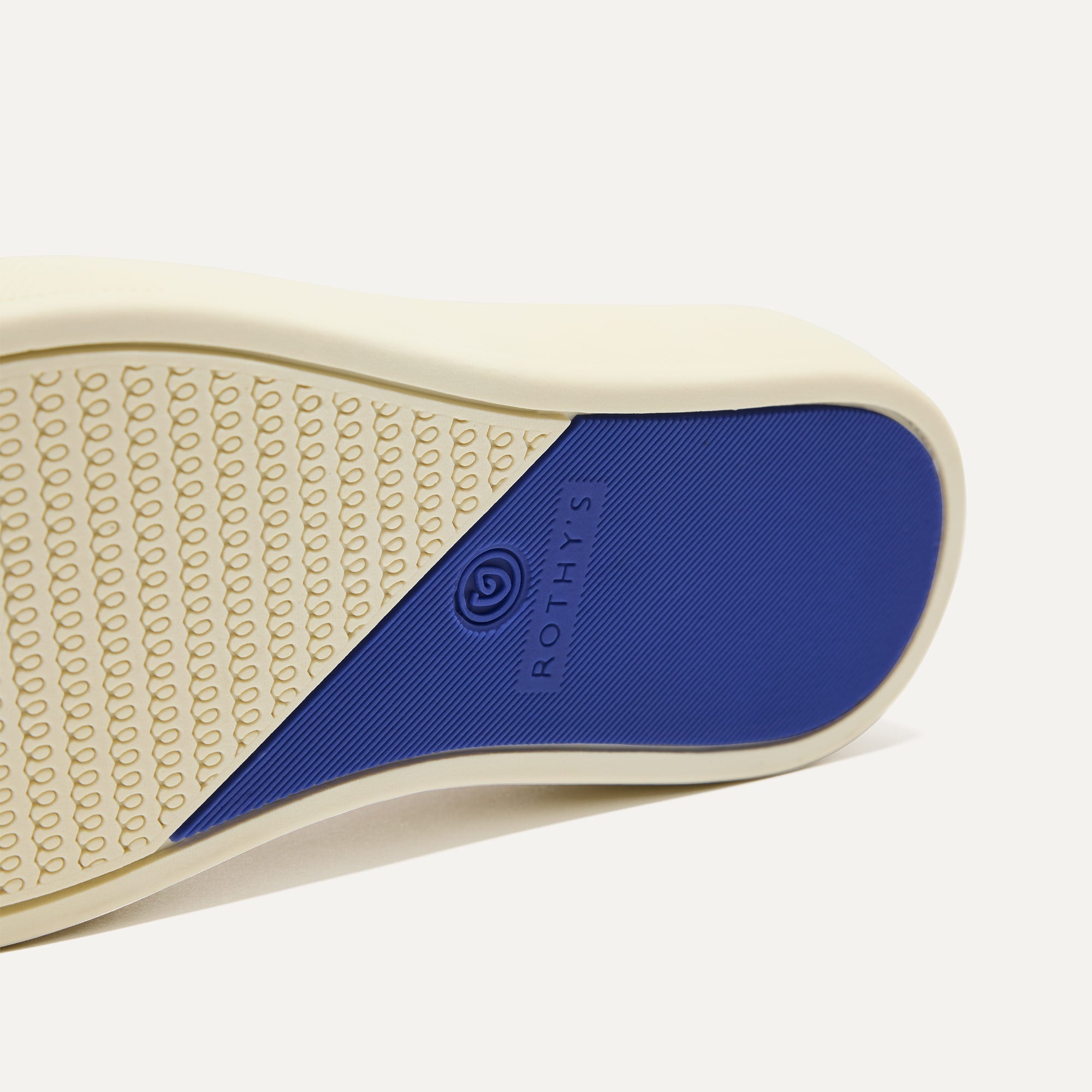 The sole of The Kids Sneaker in Sand.