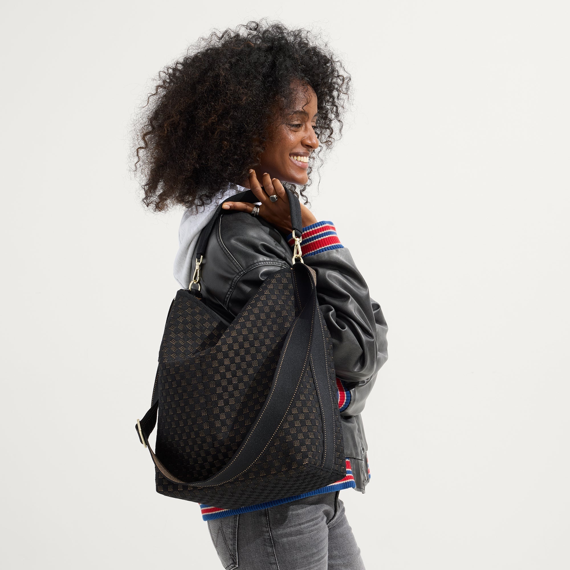 hover | The Bucket Bag in Night Song shown on model. 
