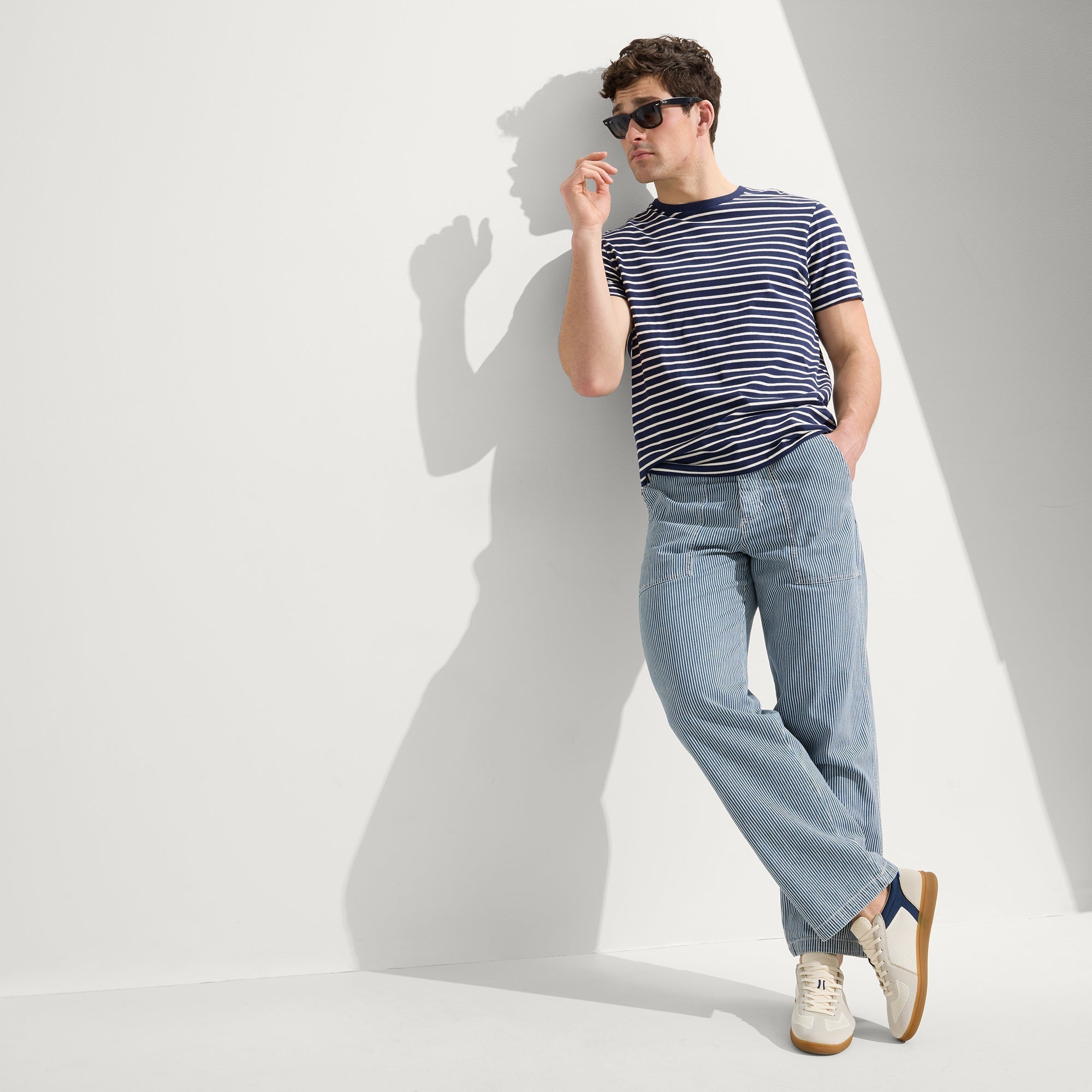 model | Alternate view of a model wearing The RS01 Sneaker in Hudson.