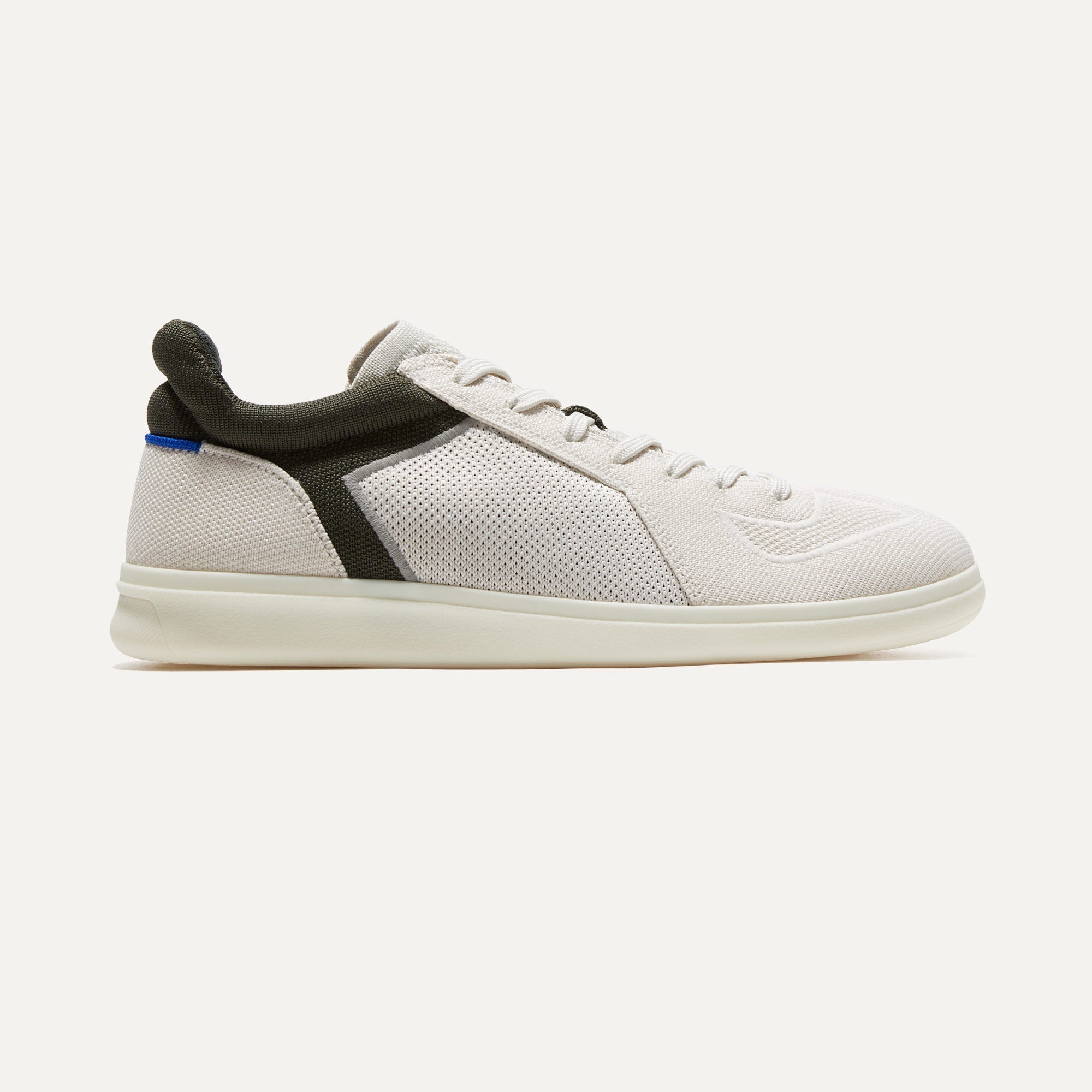 The RS01 Sneaker in Moss Green shown from the side.