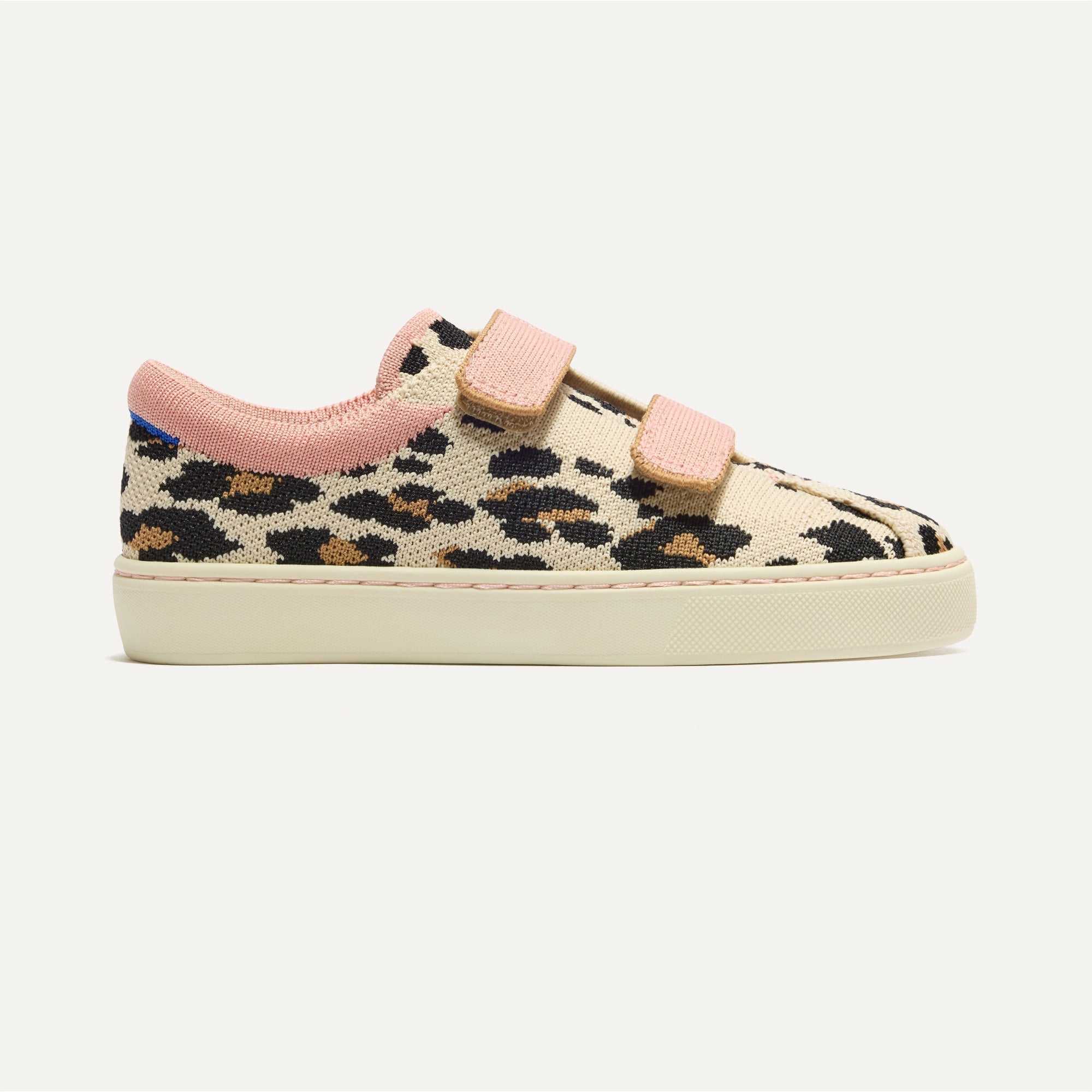side | The Kids Strap Sneaker in Cat Blush shown from the side. 