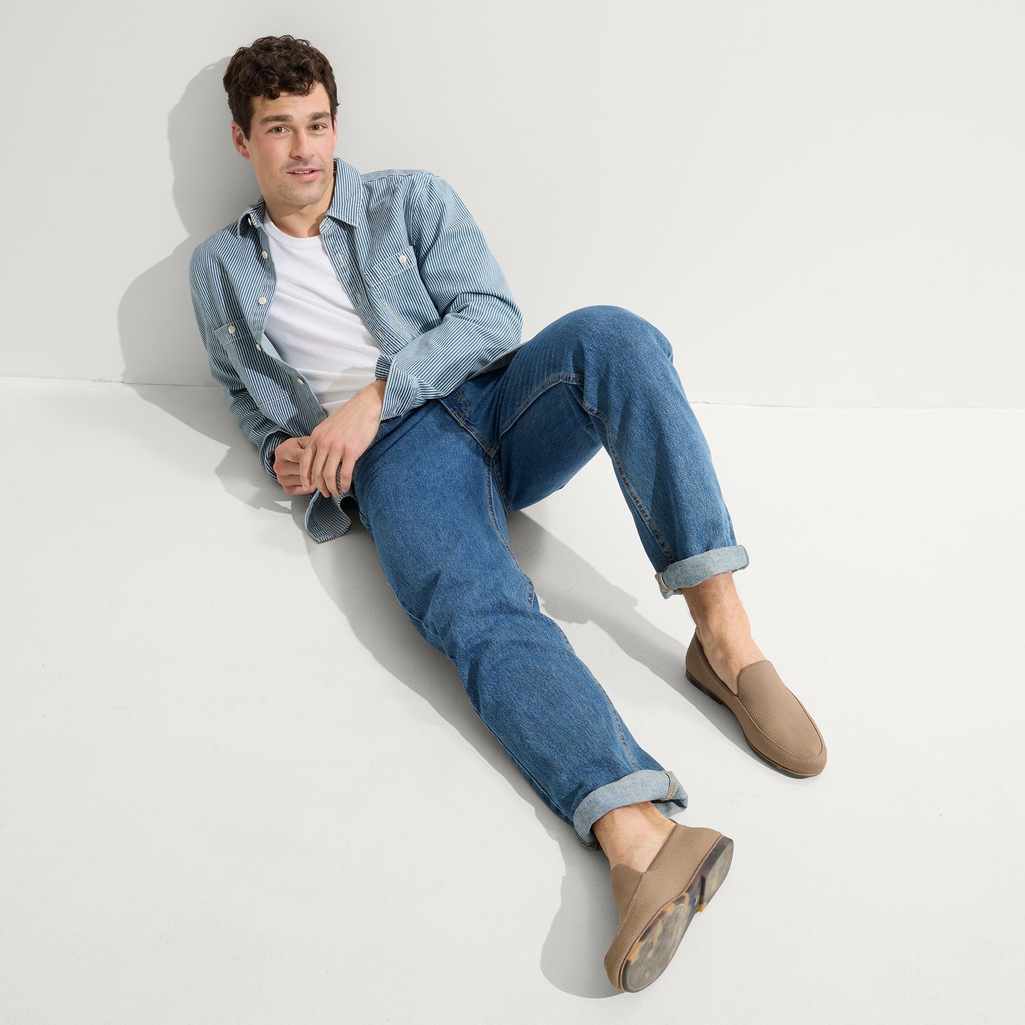 model | Alternate view of a model wearing The Ravello Loafer in Faded Brown.
