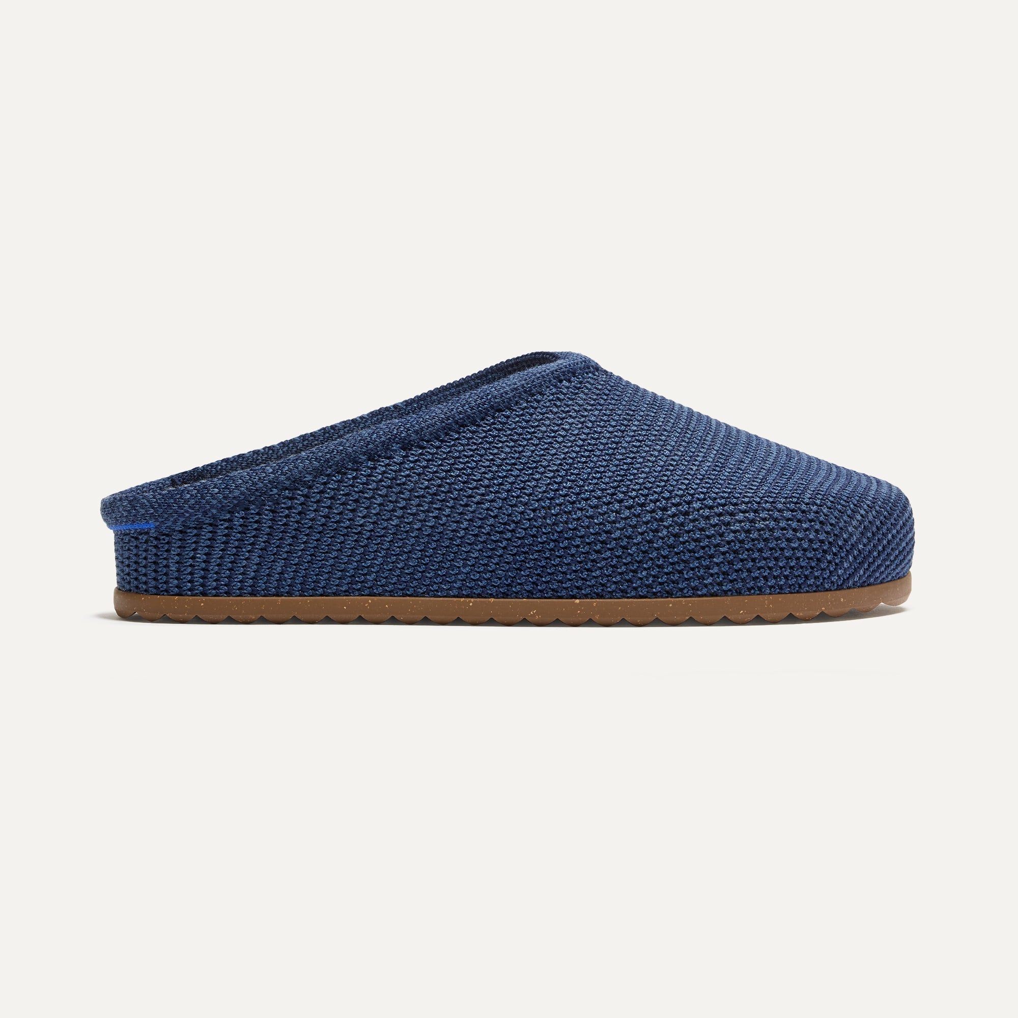 side | The Casual Clog in Blue Raffia-Knit shown from the side.