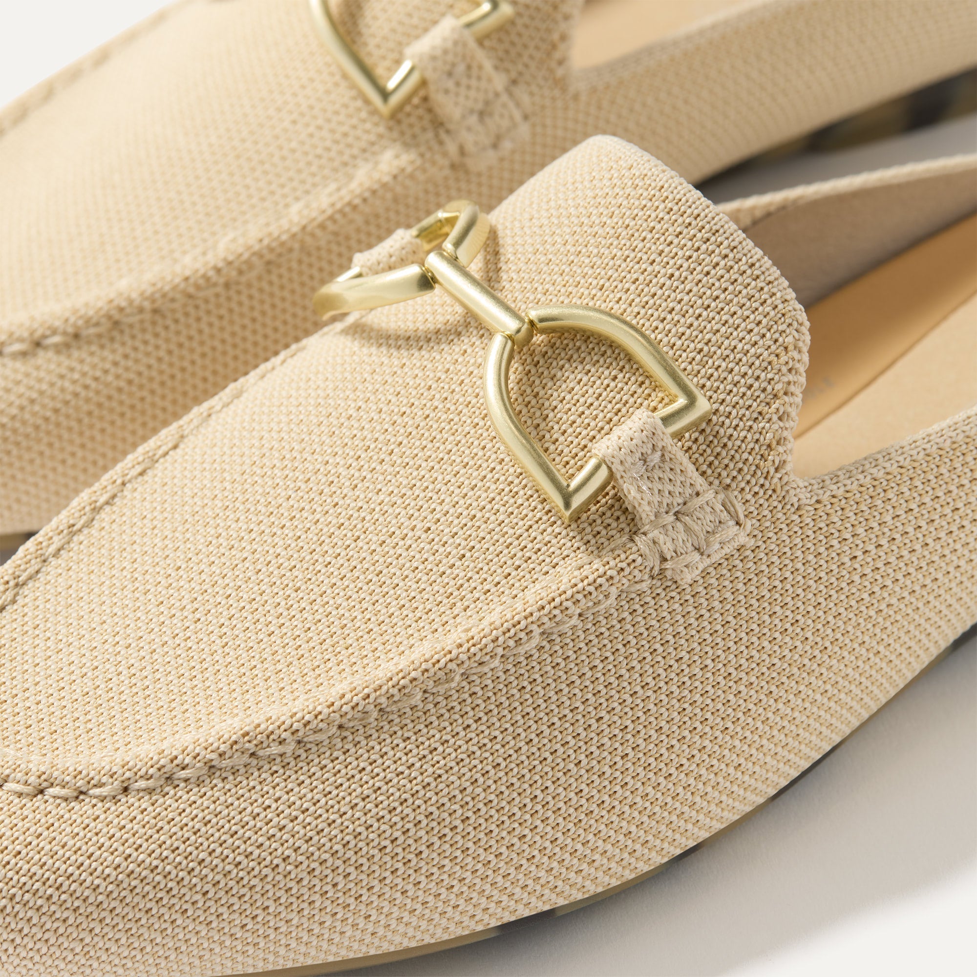 Close up of the toe and hardware of The Double Bit Loafer Mule in Sandstone. 