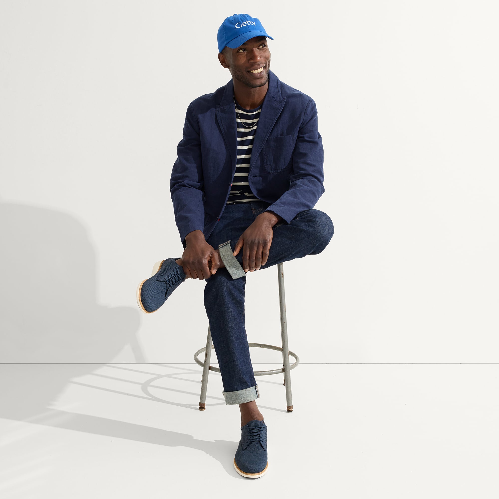 model | Alternate view of a model wearing The Oxford in Night Navy. 