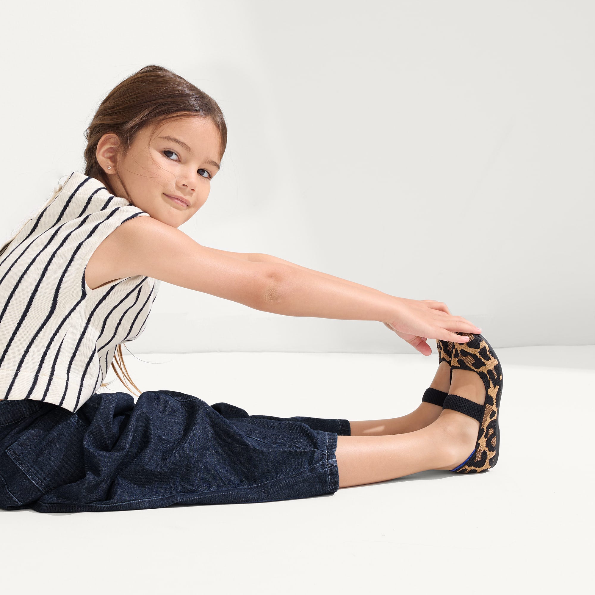 model | Alternate view of a model wearing The Kids Mary Jane in Amber Cat.
