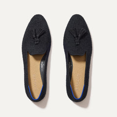 The Almond Tassel Loafer in Black Bouclé shown from the top. 