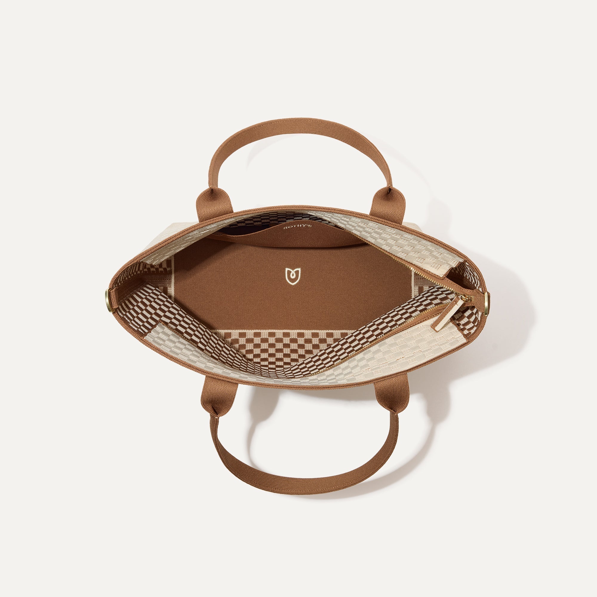 The Lightweight Zip Tote, shown from above with the interior exposed.