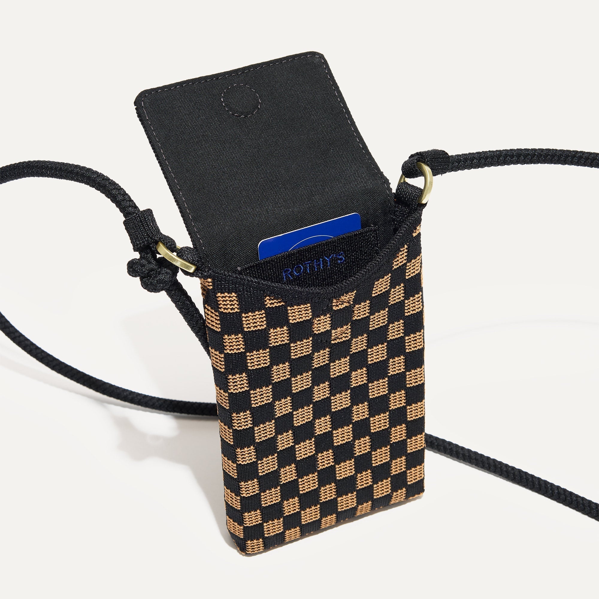 Close up of The Phone Crossbody interior slip pocket.