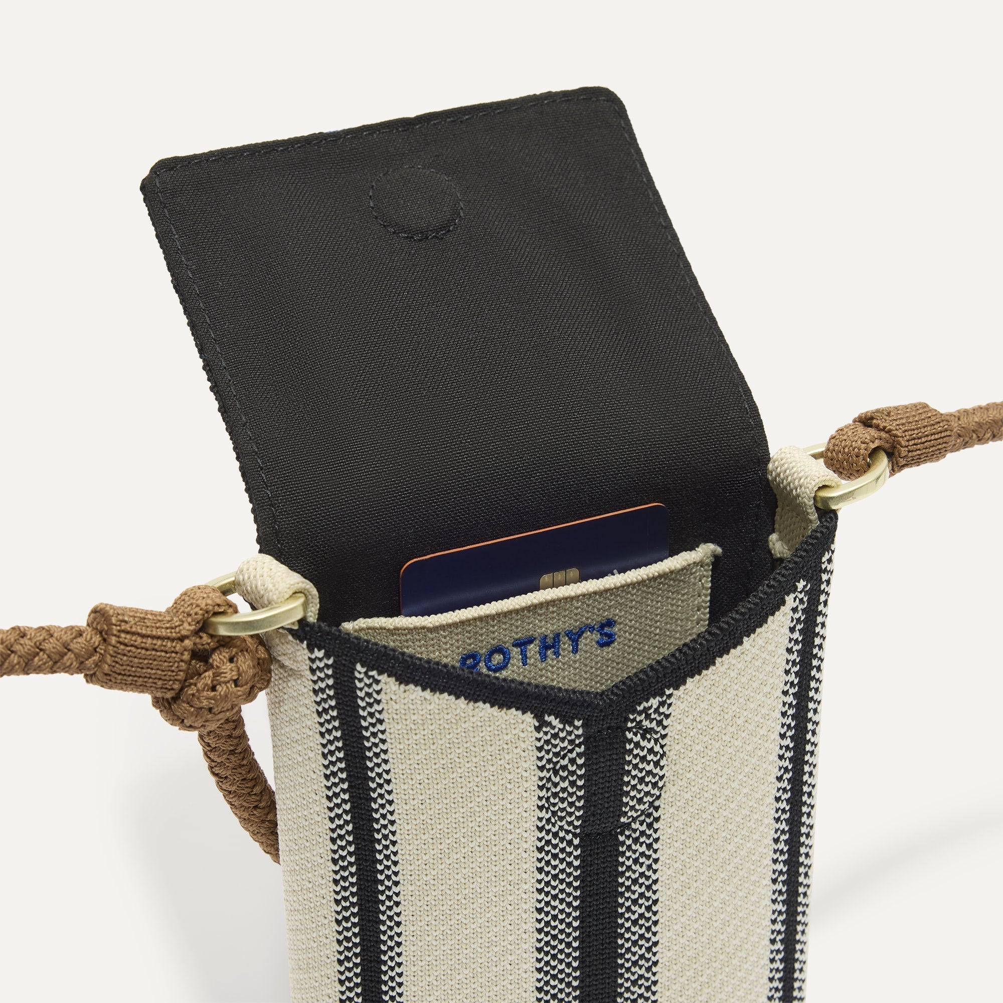 Close up of The Phone Crossbody interior slip pocket.
