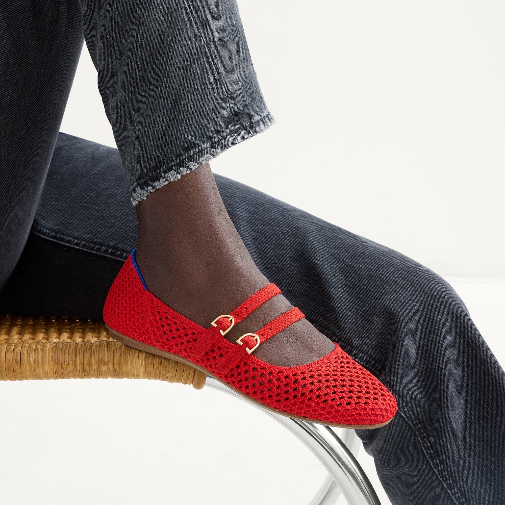 hover | Model wearing The Double Buckle Mary Jane in Bright Red Mesh.