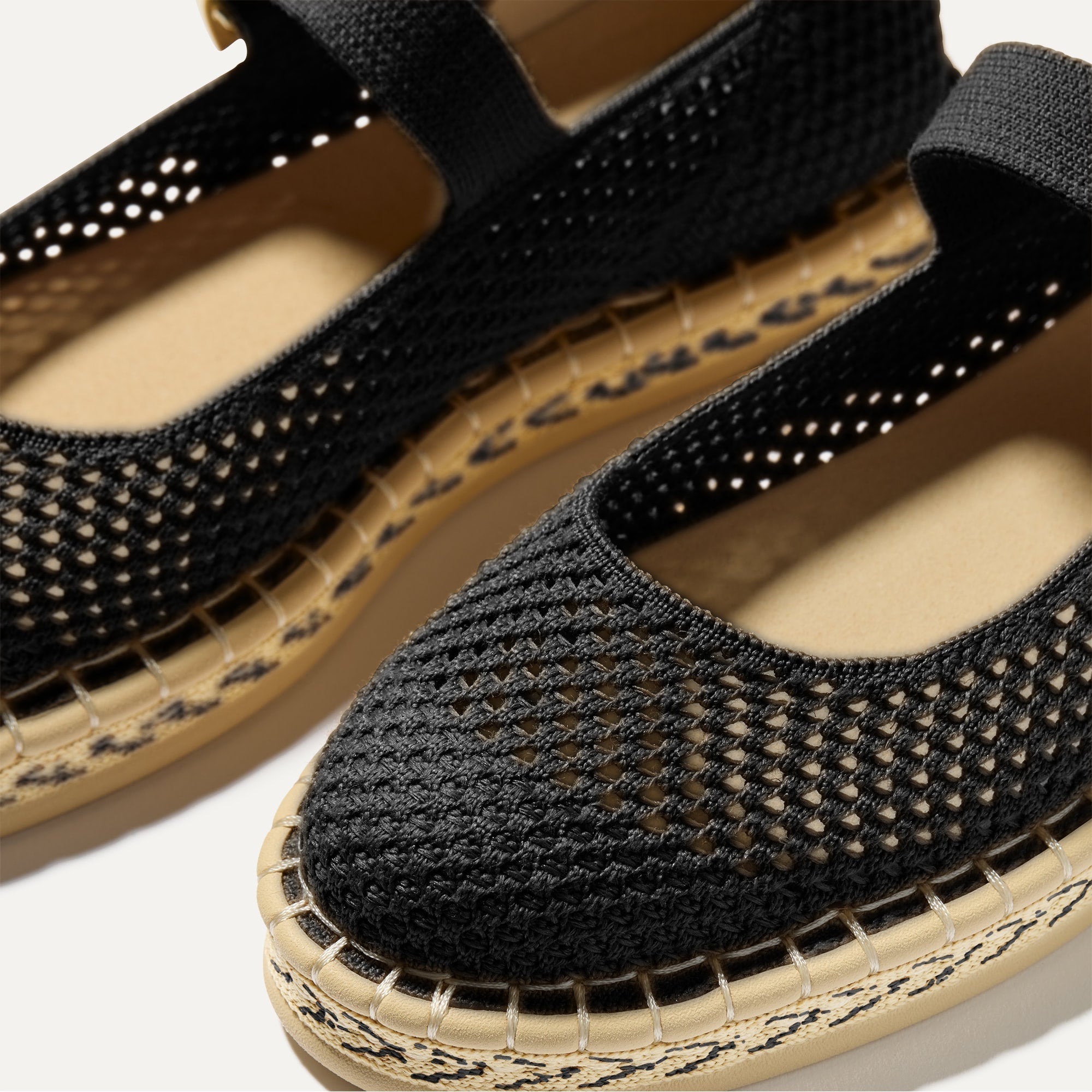 Close up of the vamp of The Espadrille Mary Jane in Black. 