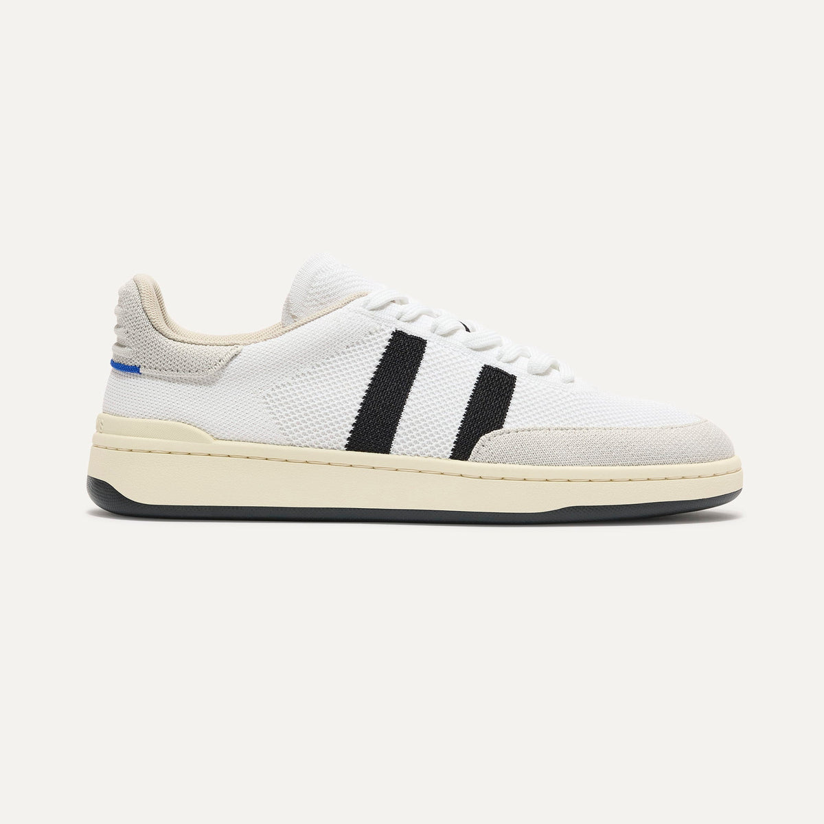 side | The Men's Court Sneaker in Black Drift shown from the side. 