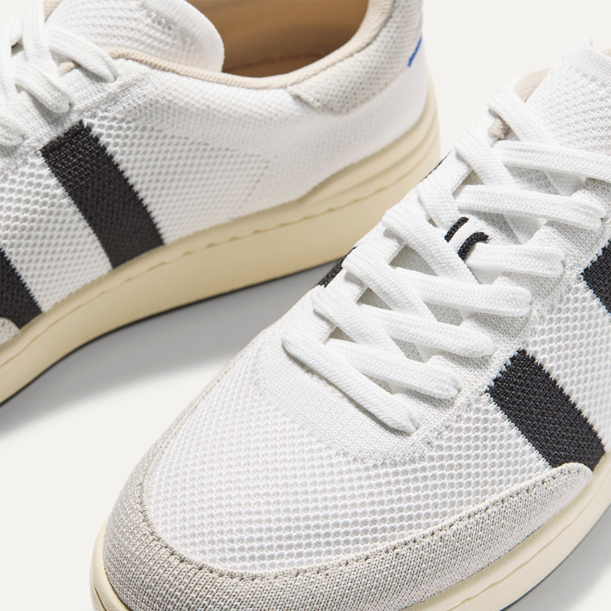 Close up of the toe and stitching details of The Men's Court Sneaker in Black Drift. 