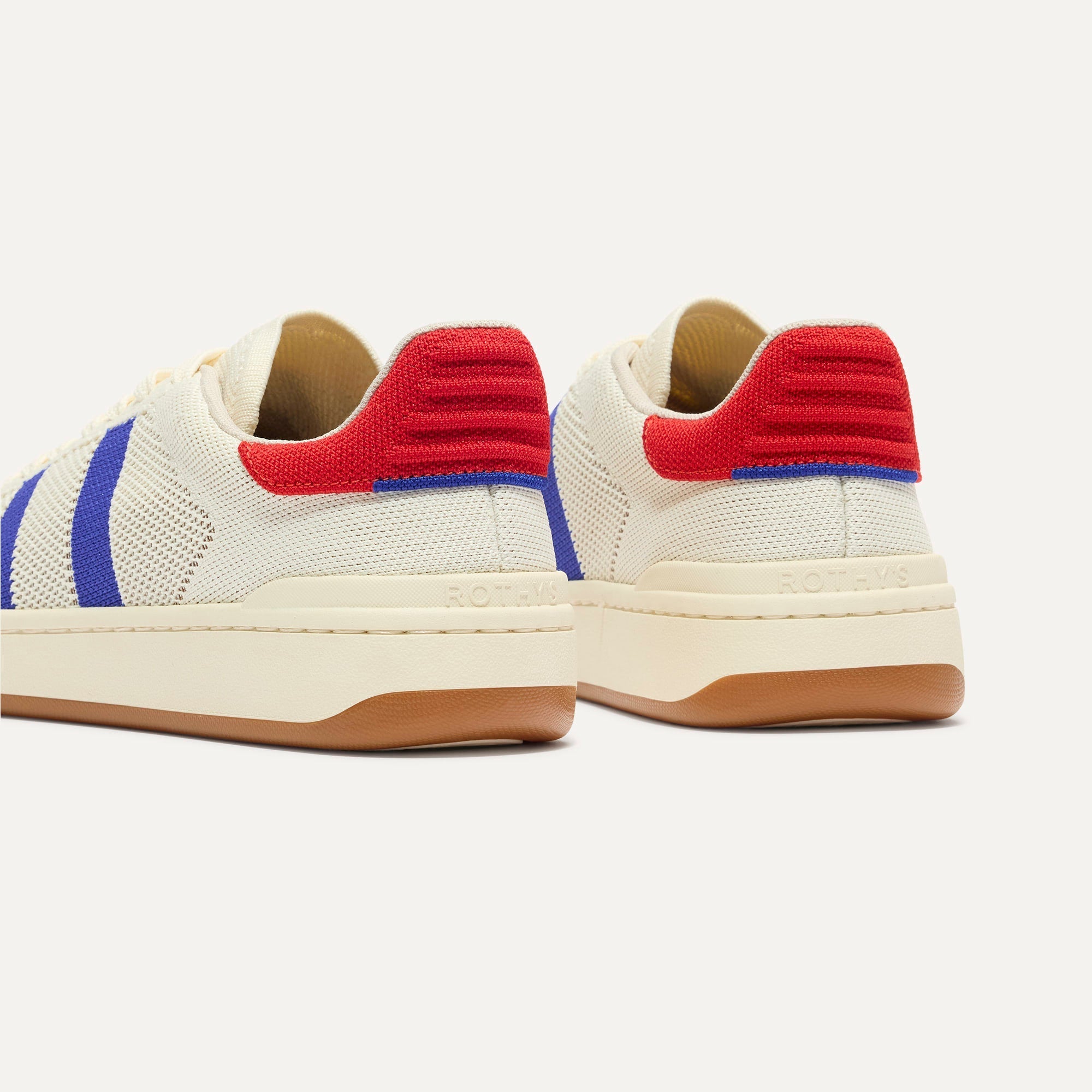 Close up of the heel of The Men's Court Sneaker in Turbo Blue, with Rothy's signature blue halo. 
