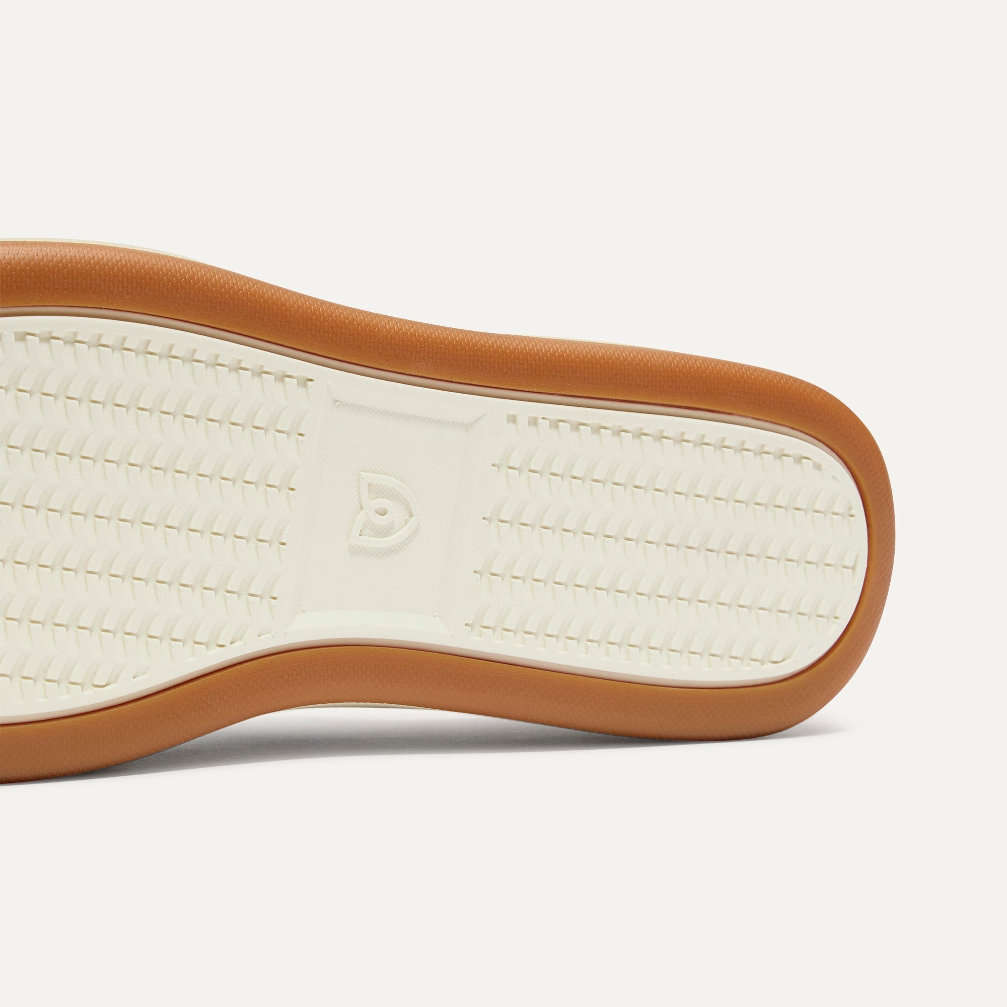 Close up of the outsoles of The Men's Court Sneaker in Turbo Blue.