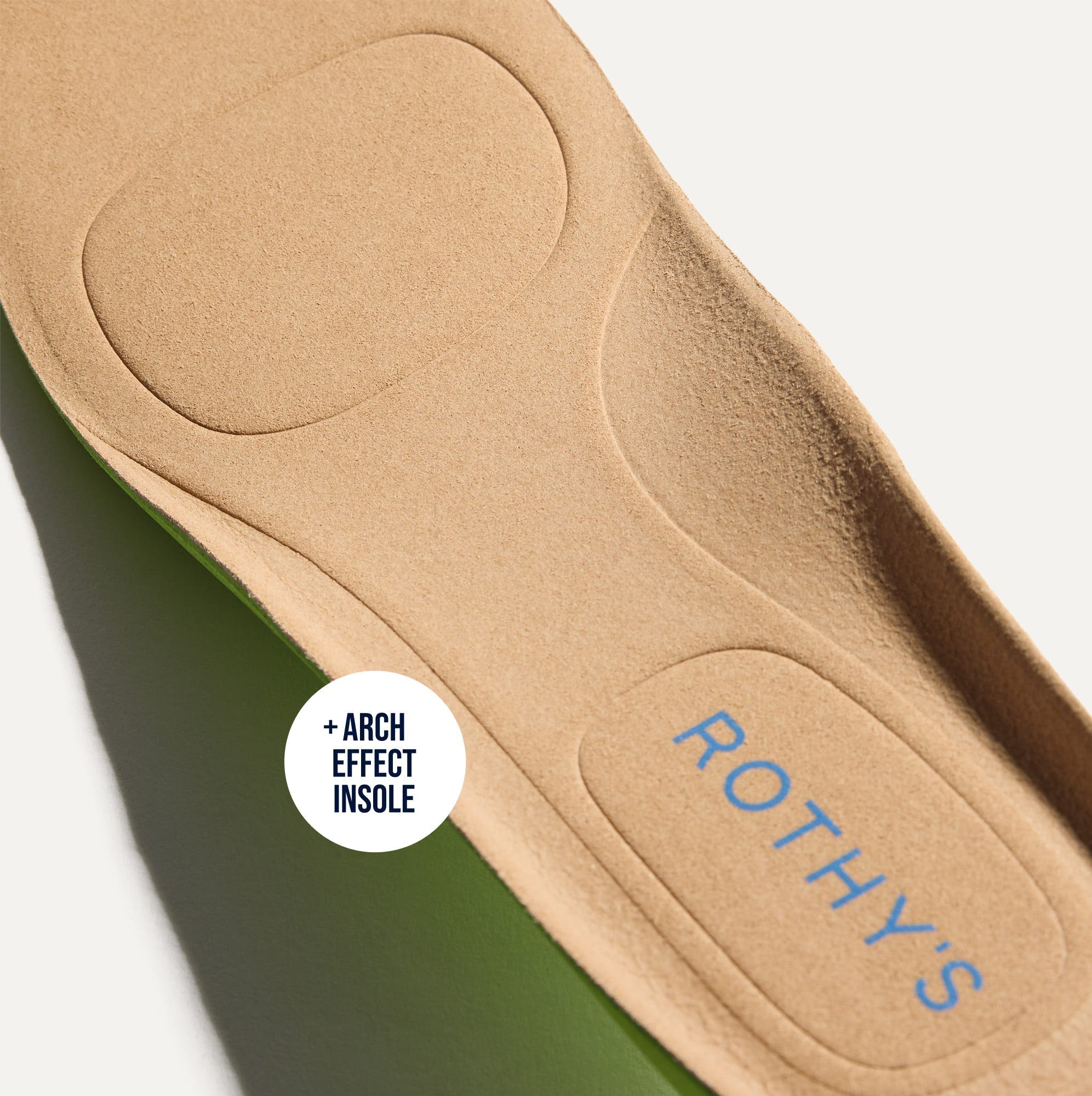 Close up of the Arch Effect Insole on The Daily Driver in Blue Sea. 