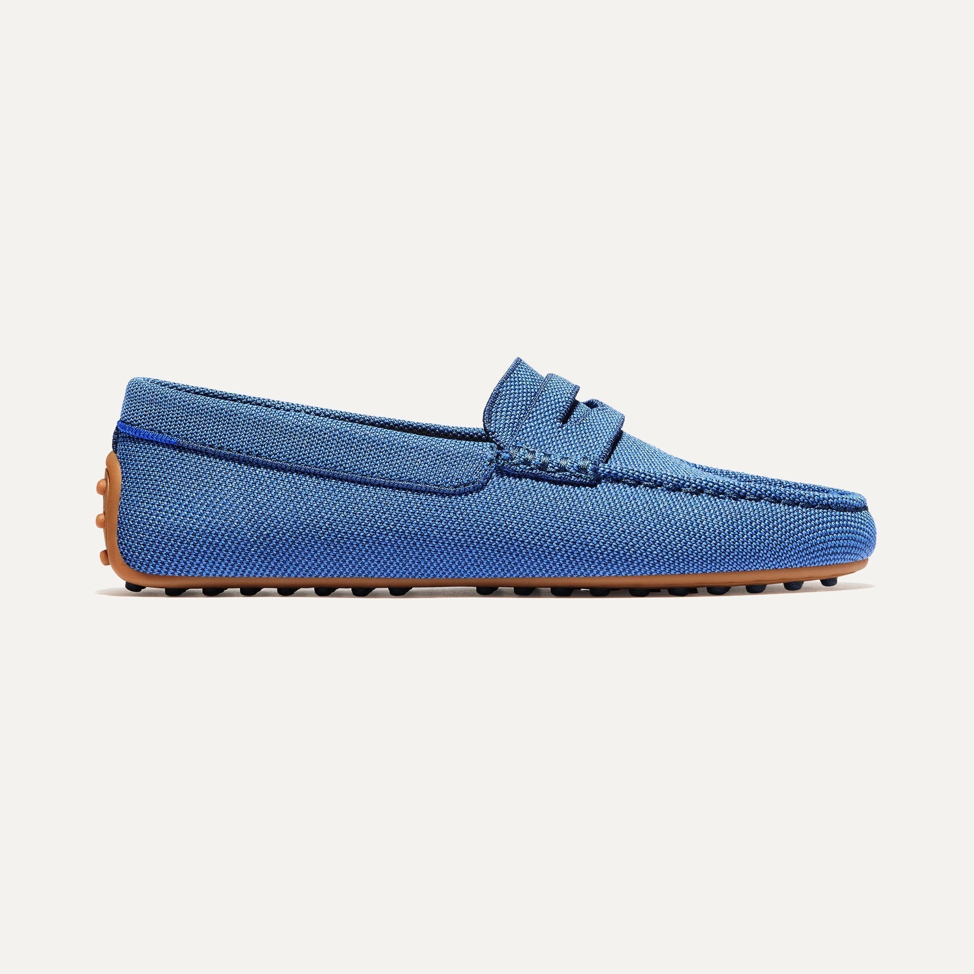 side | The Daily Driver in Blue Sea shown from the side. 