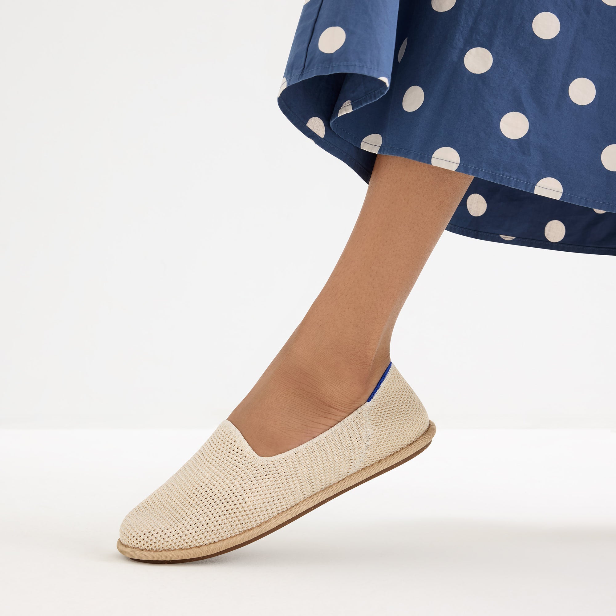 hover | Model wearing The Cruiser Loafer in White Raffia-Knit.