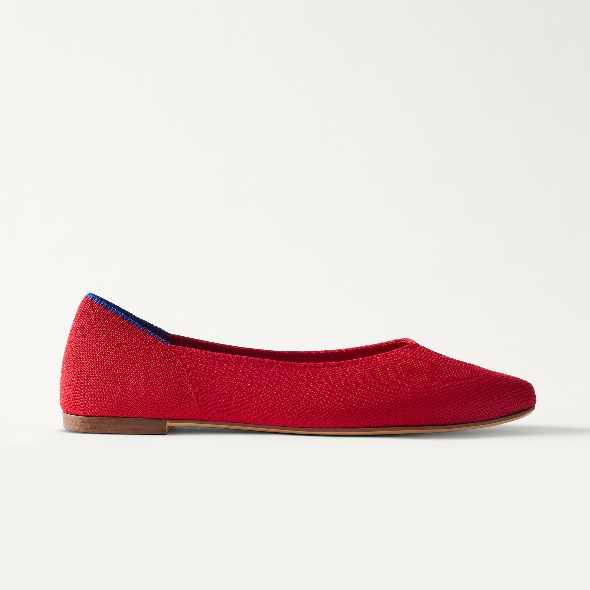 side | The Point III in Cherry shown from the side. 