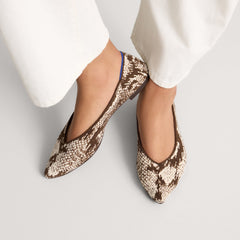 hover | Model wearing The Point III in ReVelvet Brown Python. 