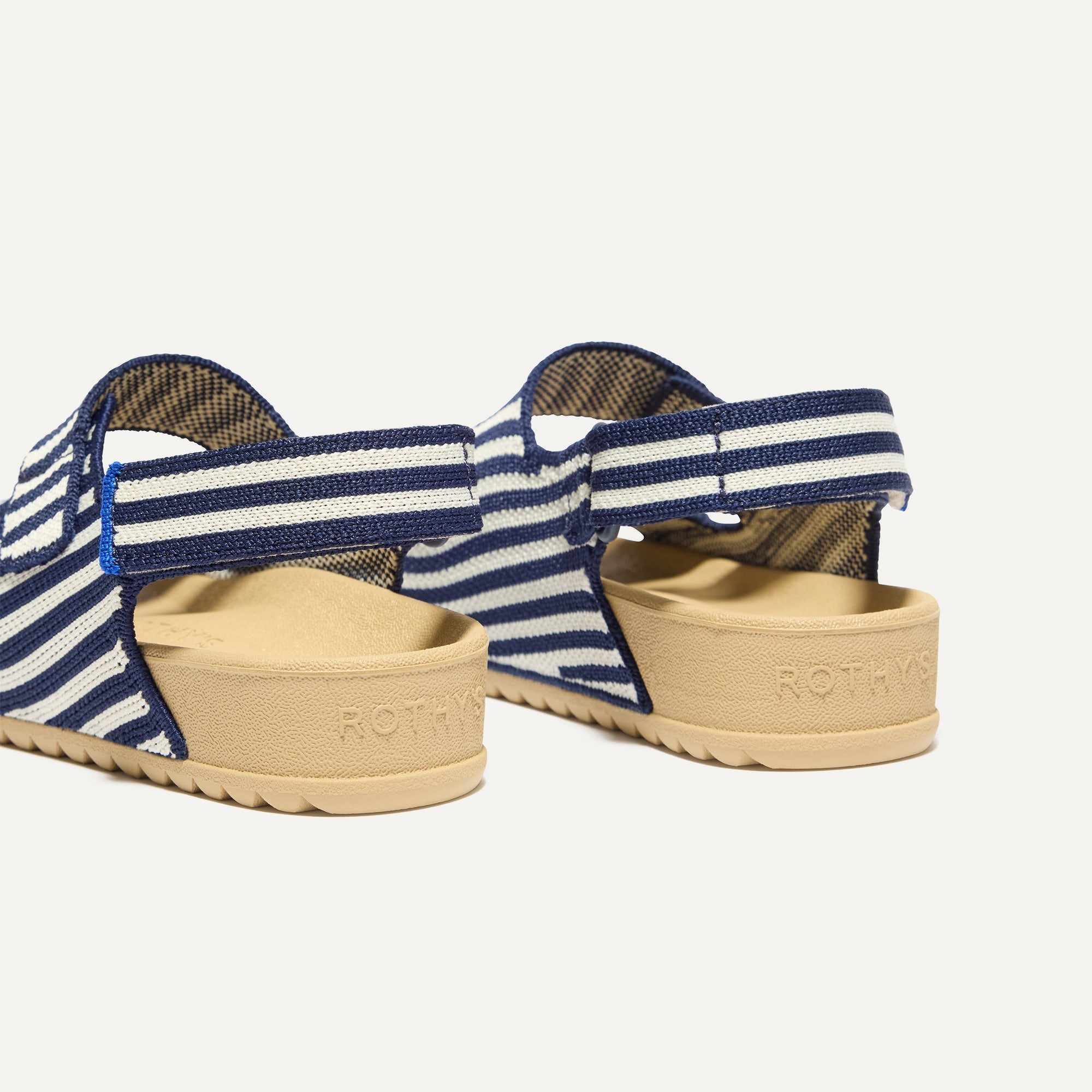 Close up of the heel strap on The Kids Double Strap Sandal in Sailor Stripes.