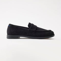 side | The Penny Loafer in ReVelvet Black shown from the side. 