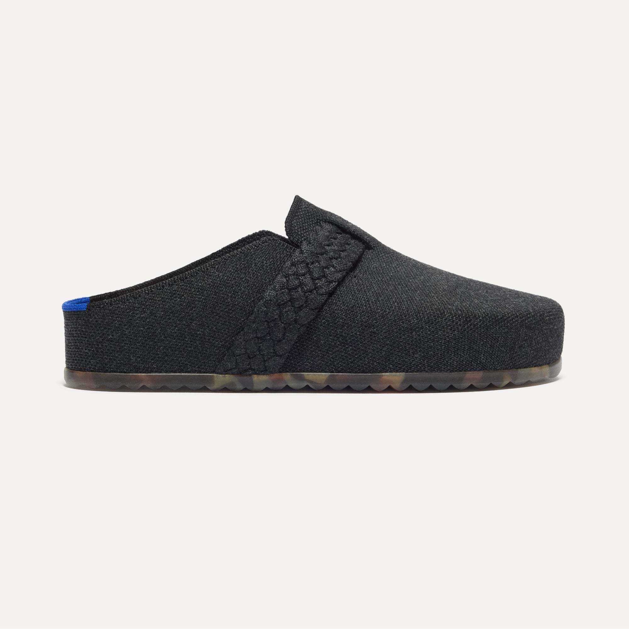 side | The Braid Clog in Black shown from the side.