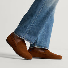 hover | Model wearing The Ravello Penny Loafer in Russet. 