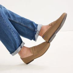 hover | Model wearing The Ravello Penny Loafer in Morel. 