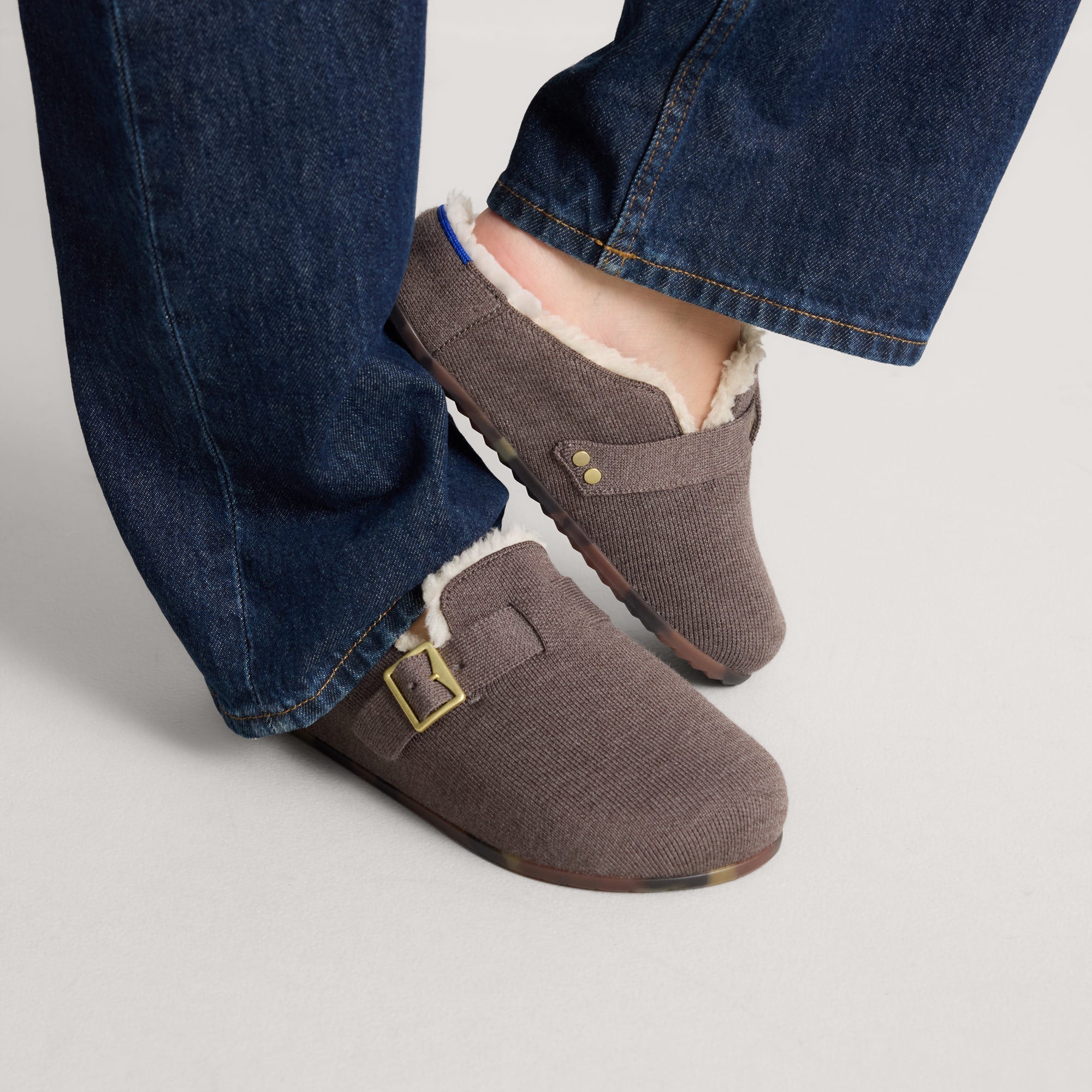 hover | Model wearing The Teddy Buckle Clog in Porcini.