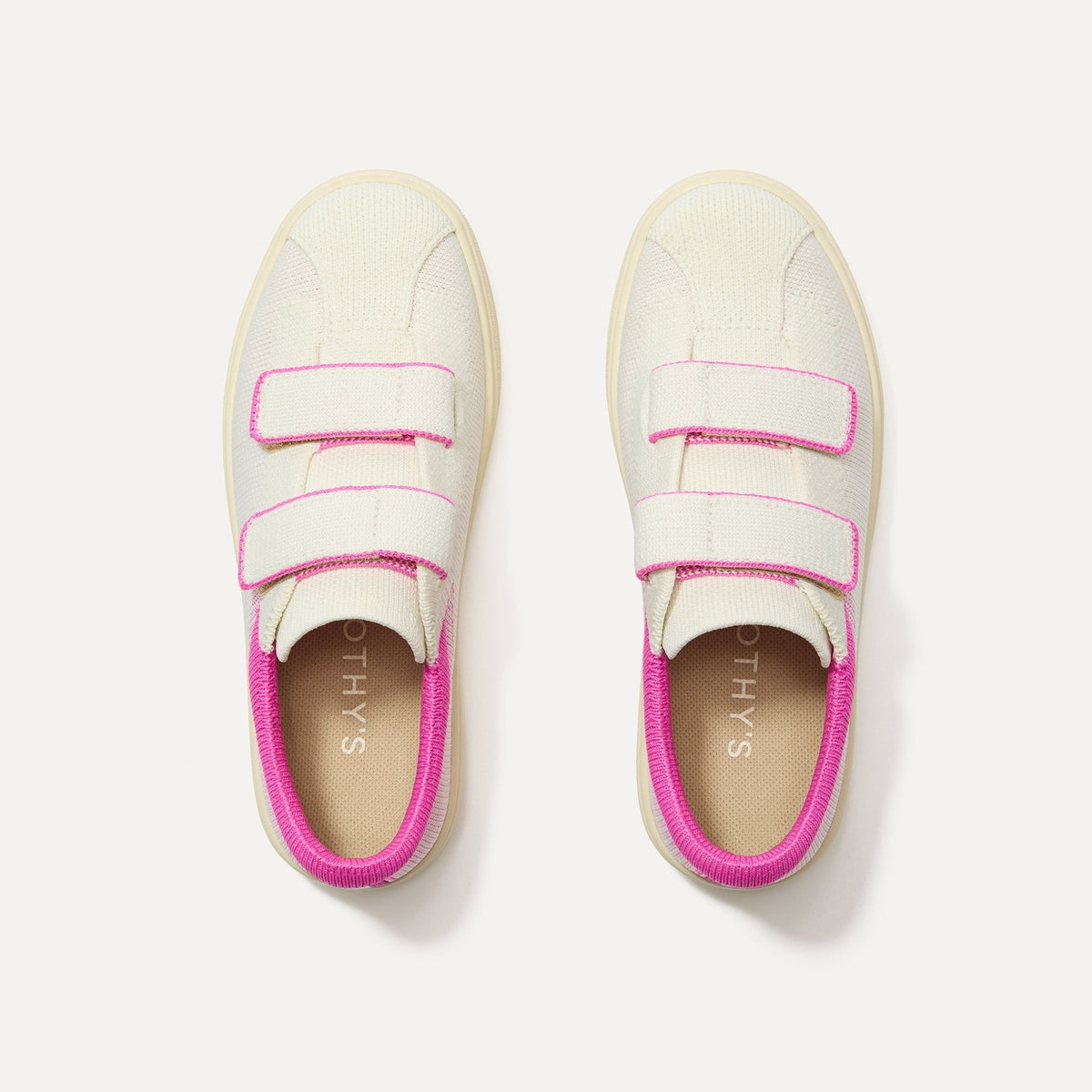 The Kids Strap Sneaker in Pink Taffy shown from the top. 