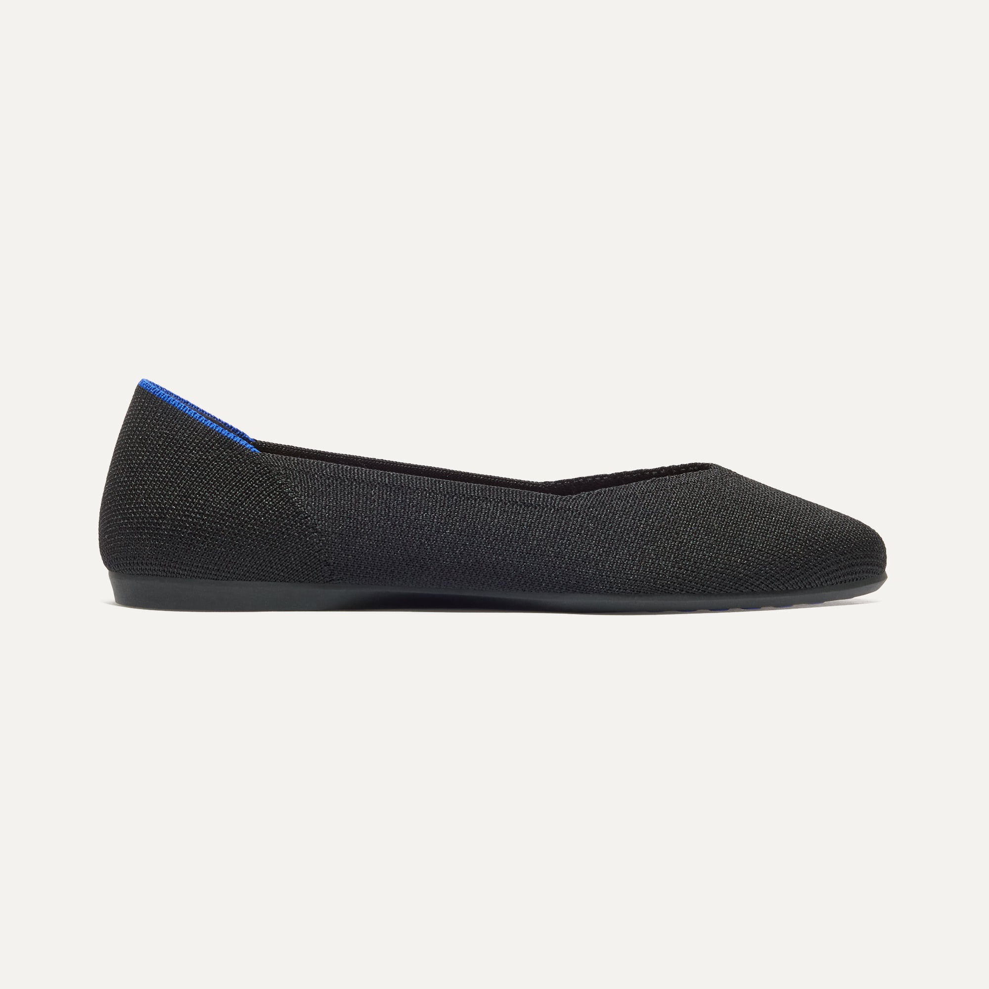 side | The Daily Flat in Black shown from the side. 