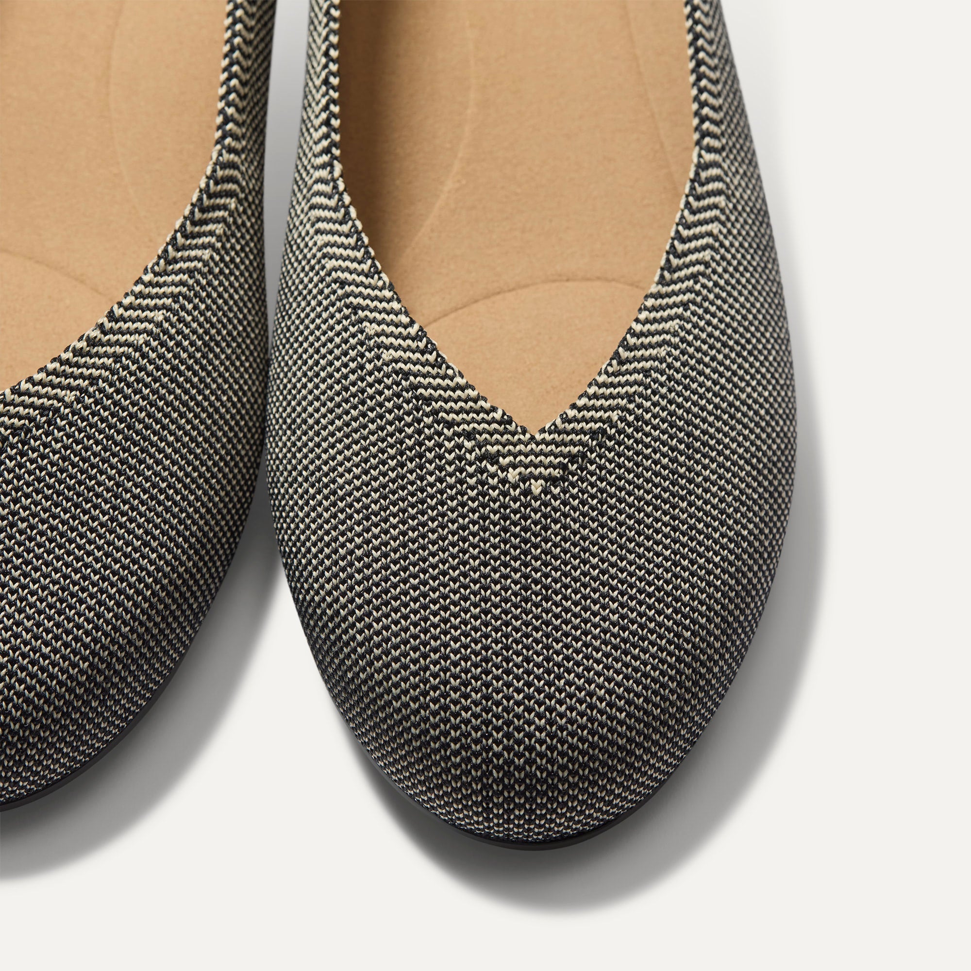 Close up of the toe and vamp of The Daily Flat in Salt Air. 