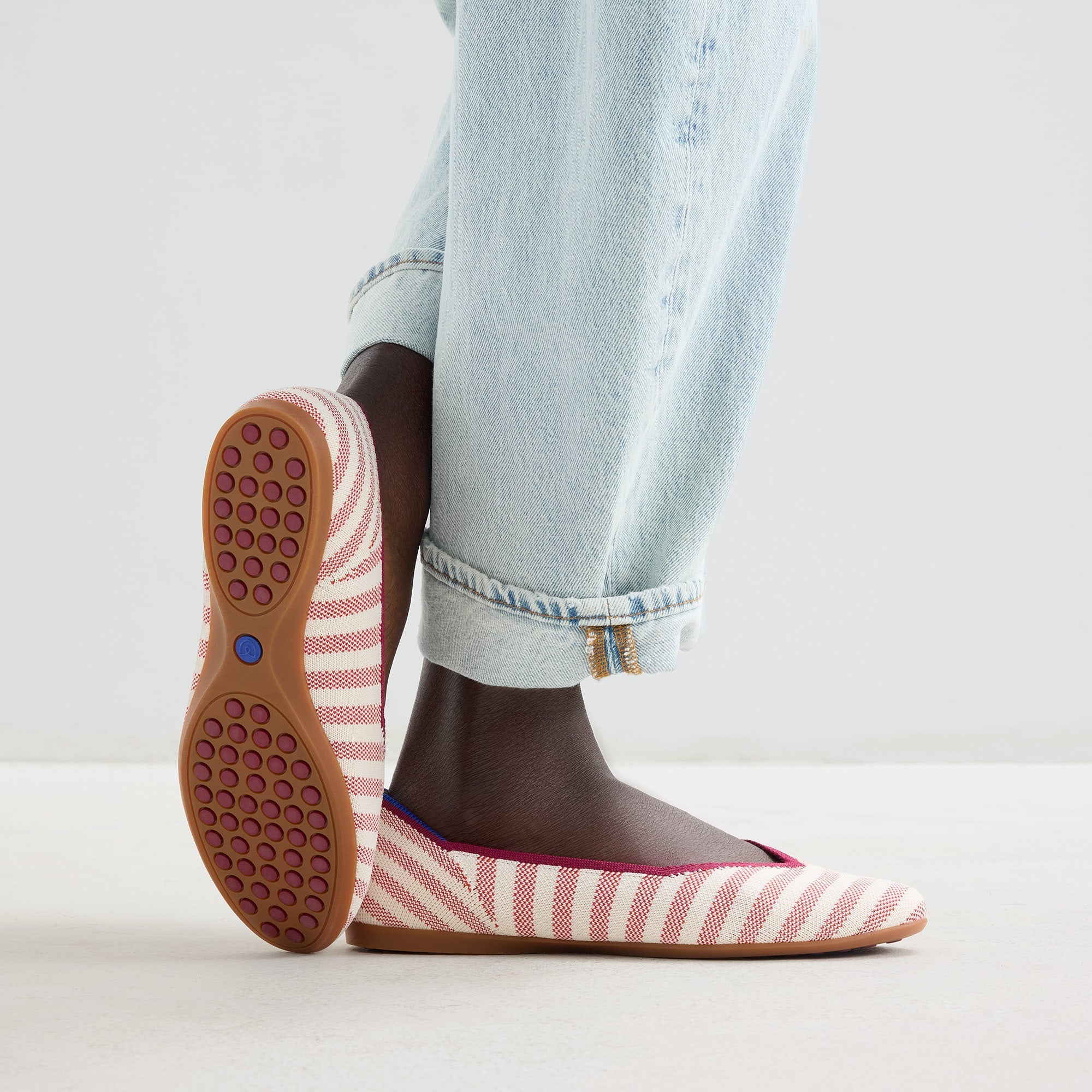 hover | Model wearing The Daily Flat in Coral Cabana Stripe. 