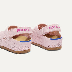 Close up of the back heel strap of The Kids Clog in Pink Crochet.