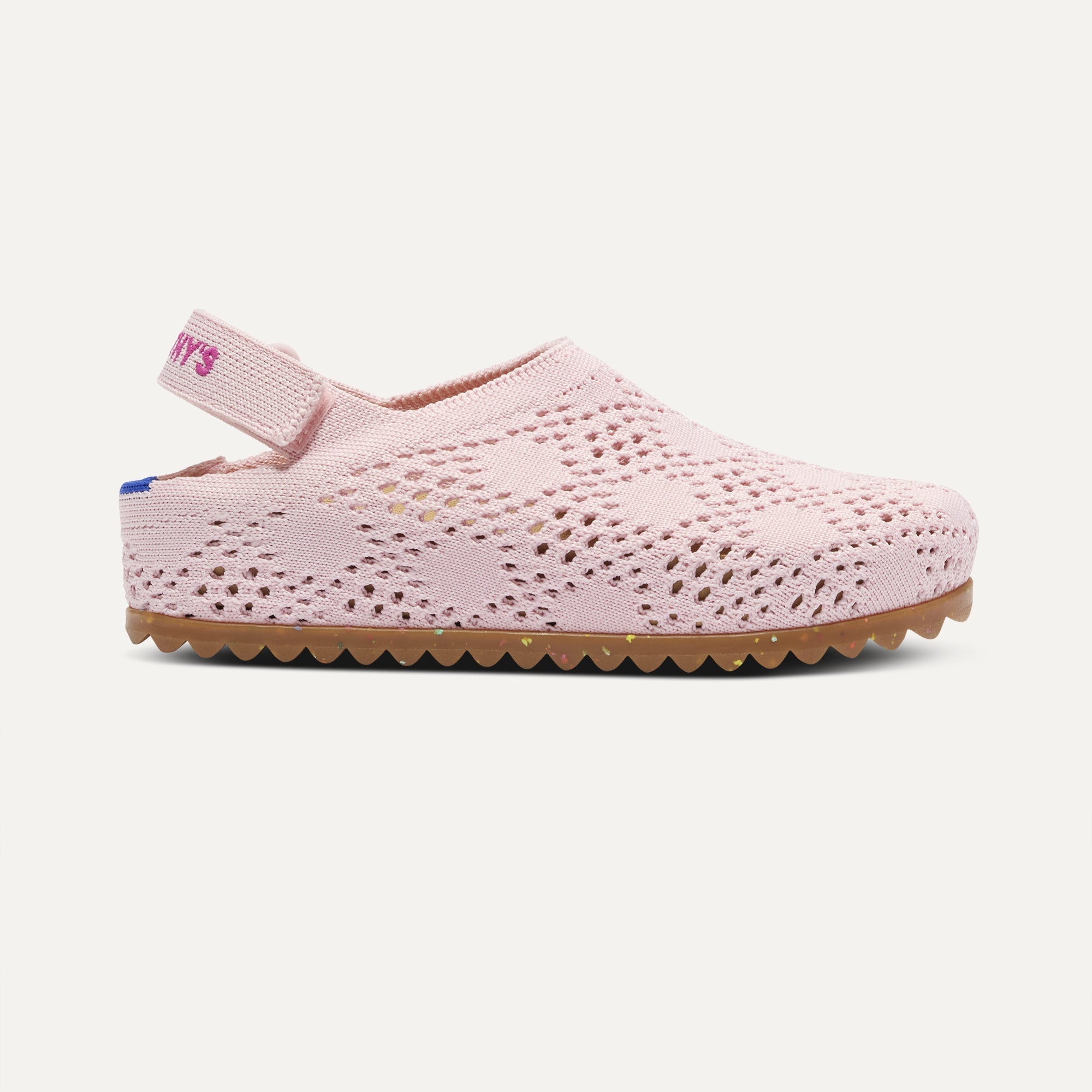 side | The Kids Clog in Pink Crochet shown from the side. 