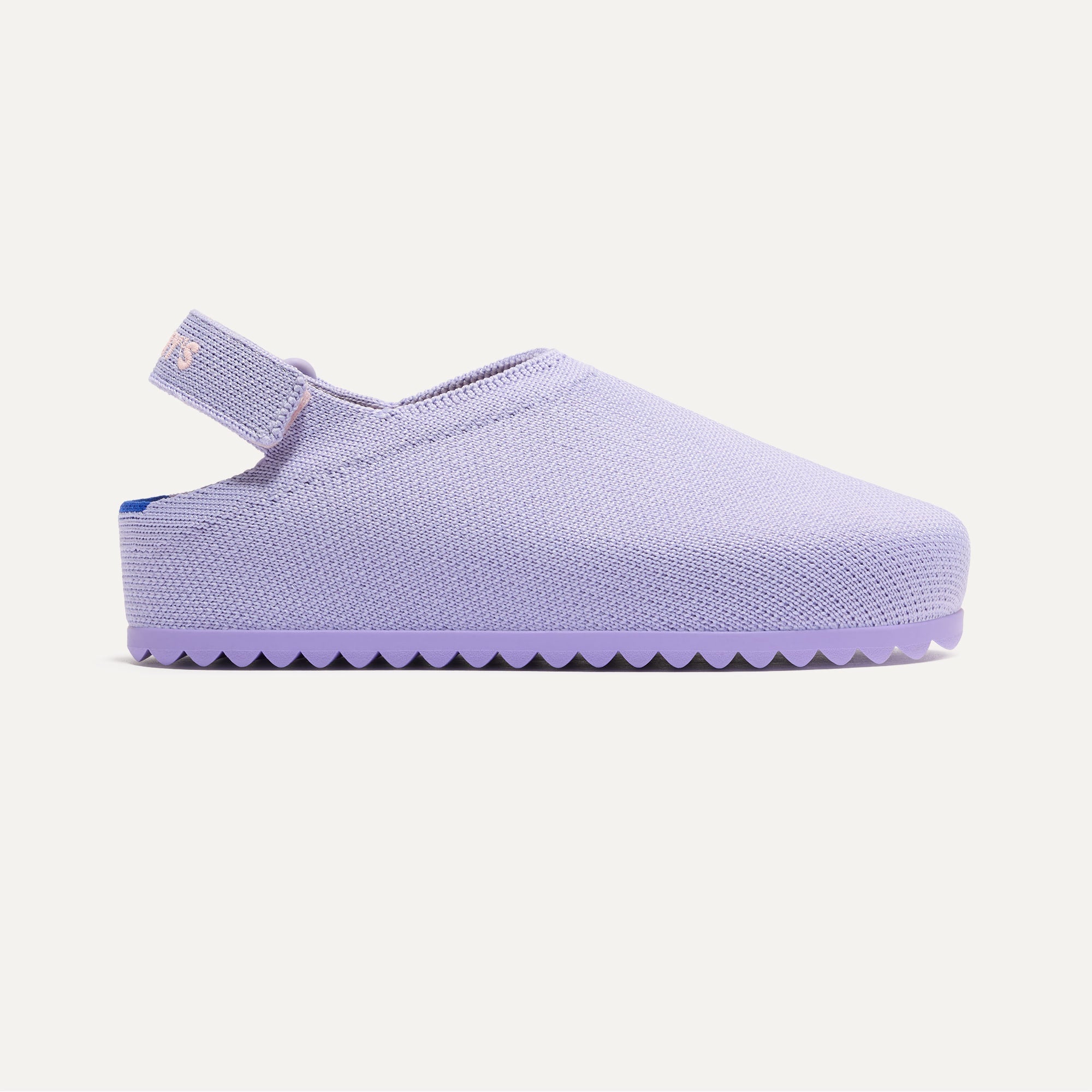 side | The Kids Clog in Soft Orchid shown from the side. 