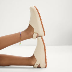 hover | Model wearing the Kids Clog in Conch.