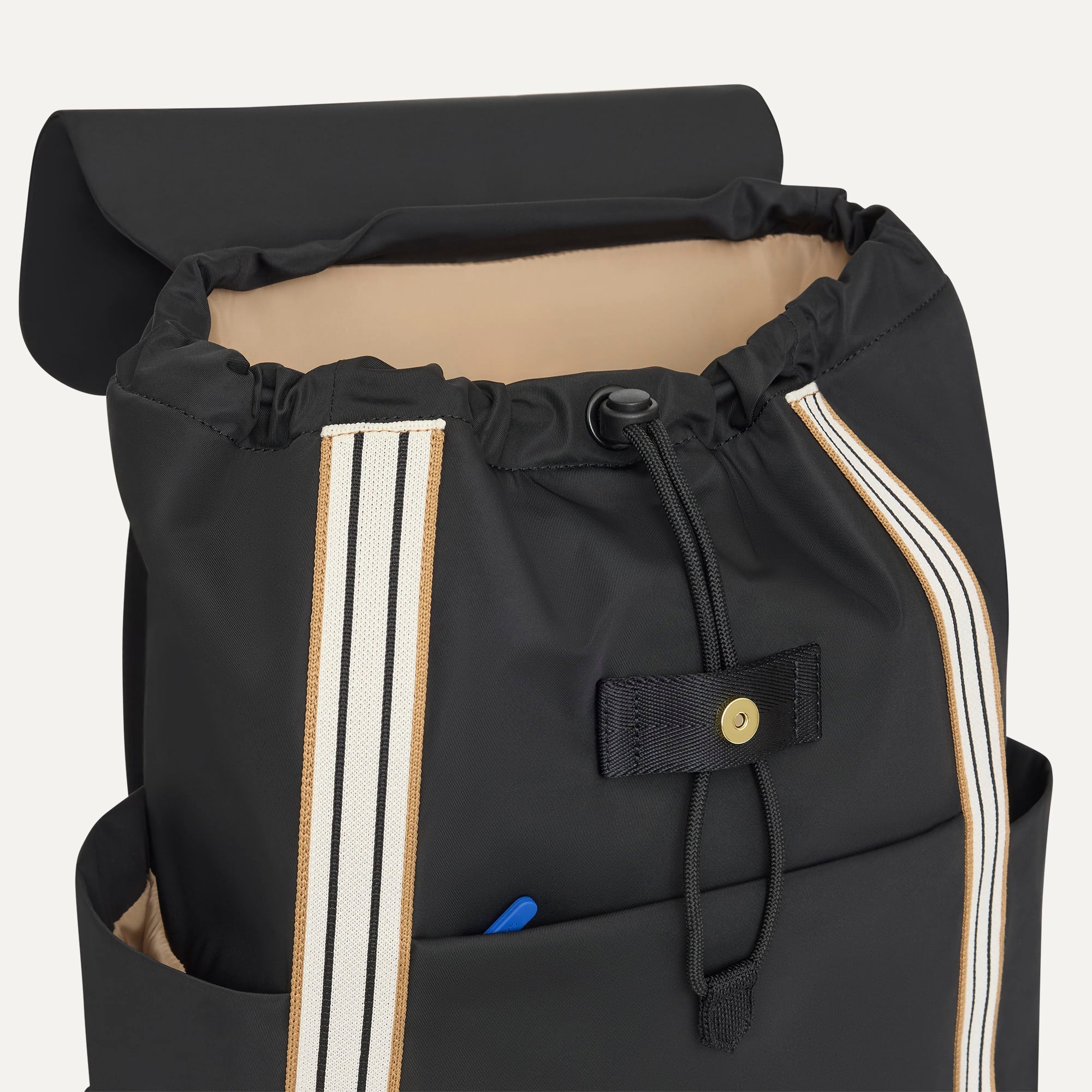 A close up of The Travel Cinch Backpack in Ink showing the drawstring closure.