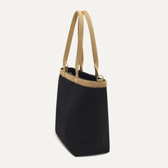 The Lightweight Zip Tote in Black Espresso Open-Knit, shown from the side.